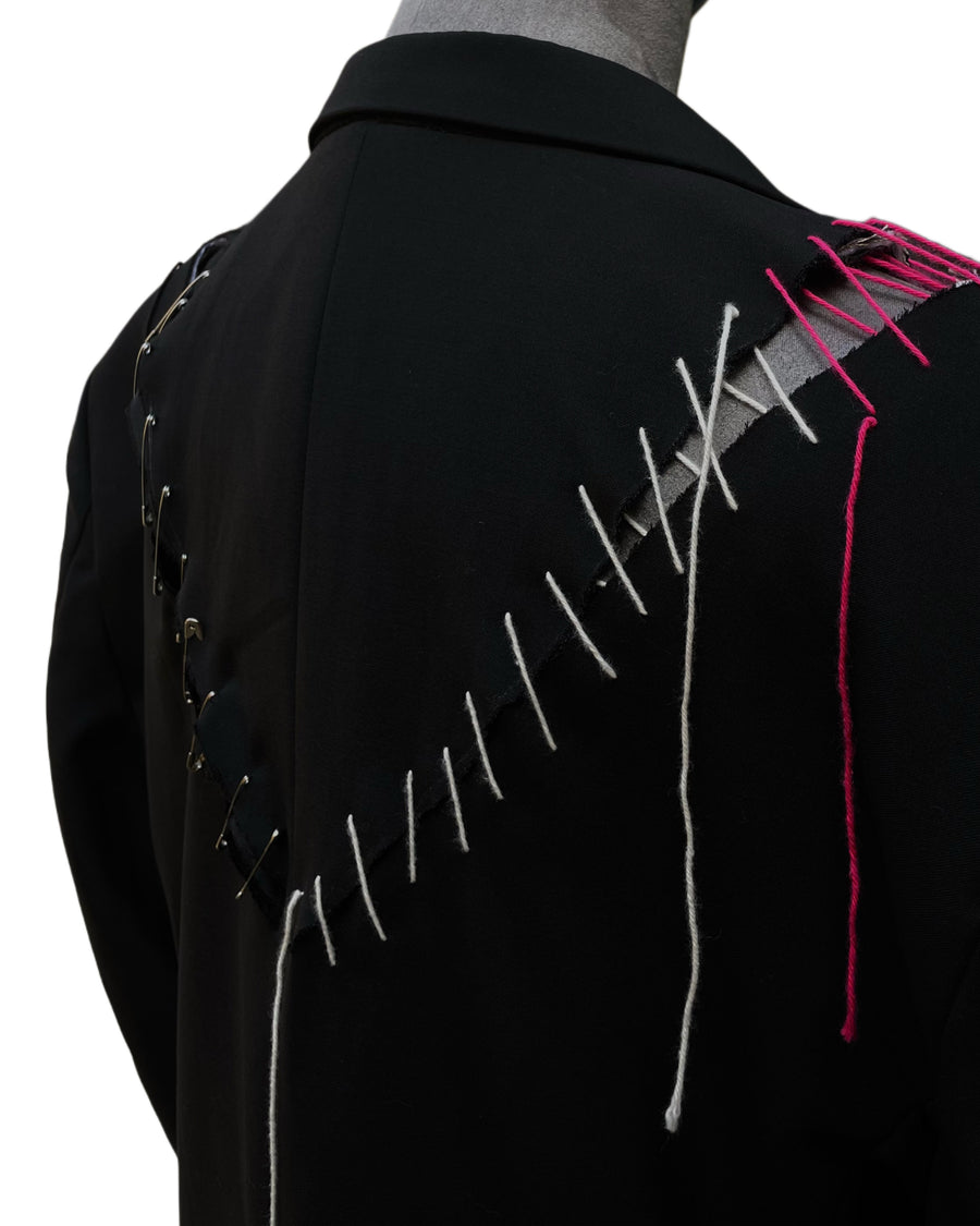 blazer nero con fiocco rosa